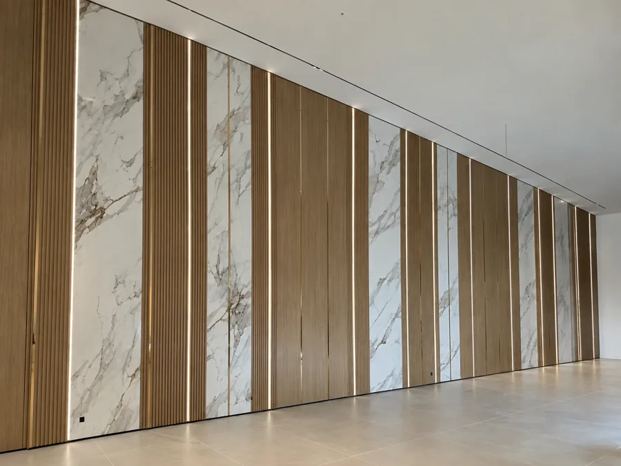 The same double-height wall in daylight